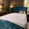 Teal velvet heart wing bed with crystal-buttoned scalloped winged headboard by Hauser Interiors