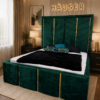 Emerald green velvet Oro Elegante bed with gold chevron inlays by Hauser Interiors