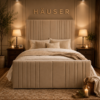 Valentino upholstered bed in cream velvet with tall fluted headboard and panelled footboard by Hauser Interiors